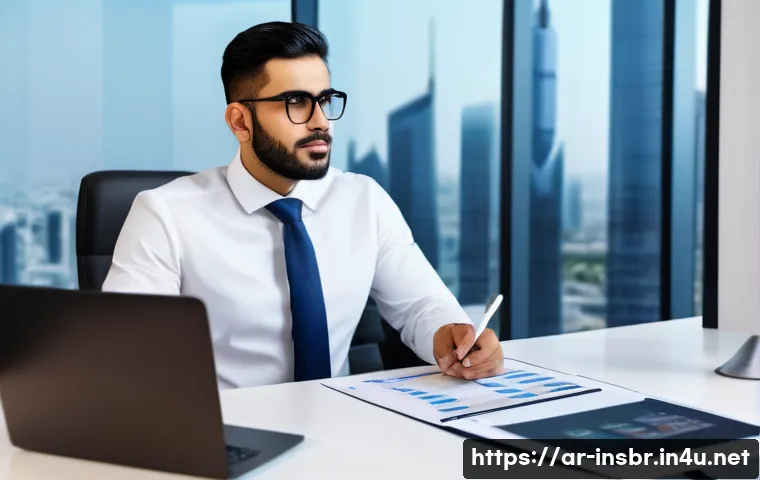 보험중개사 자격증 갱신 주기와 절차 - A professional Arab male insurance broker sitting at a modern office desk, focused on a laptop scree...